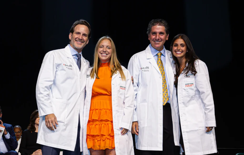 From left, Andrew Sable, M.D. ’98, with Mia Schatz, M.D. candidate, Class of 2027, and Scott Levin, M.D. ’93, with daughter Sabrina Levin, M.D. candidate, Class of 2027