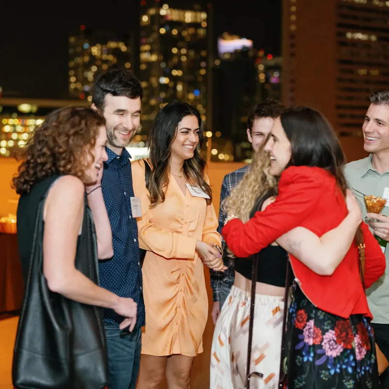 umni and guests getting reacquainted at the Welcome Reception