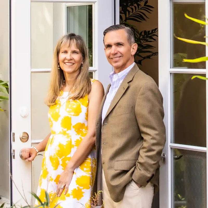 The garcias pose for a photo in their back yard