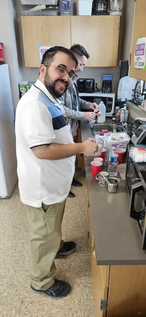 medical student posts for photo in lab